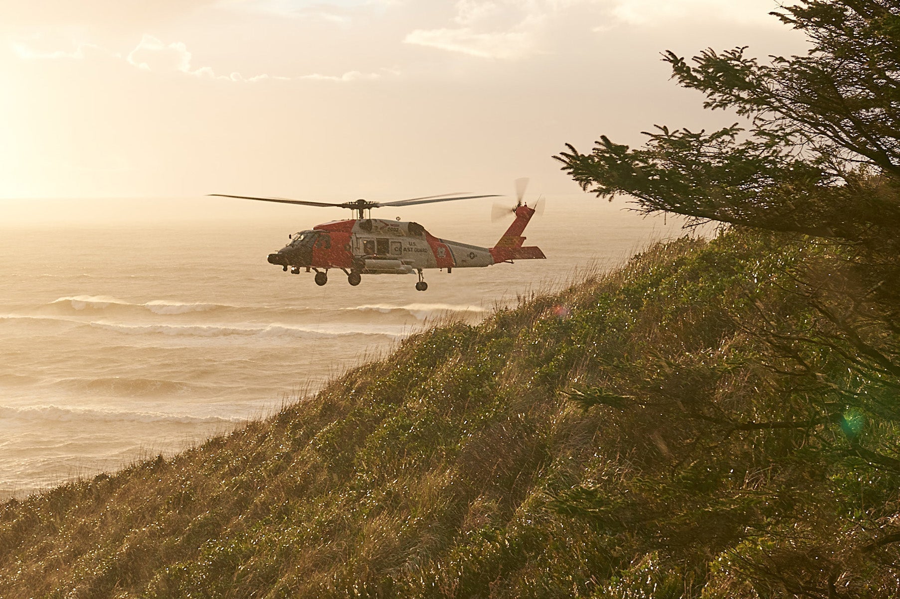 H-60 helicopter in flight — UH-60 Black Hawk, MH-60 Seahawk, MH-60T Jayhawk, and HH-60 Pave Hawk crew gear by Rescue Swimmer Shop